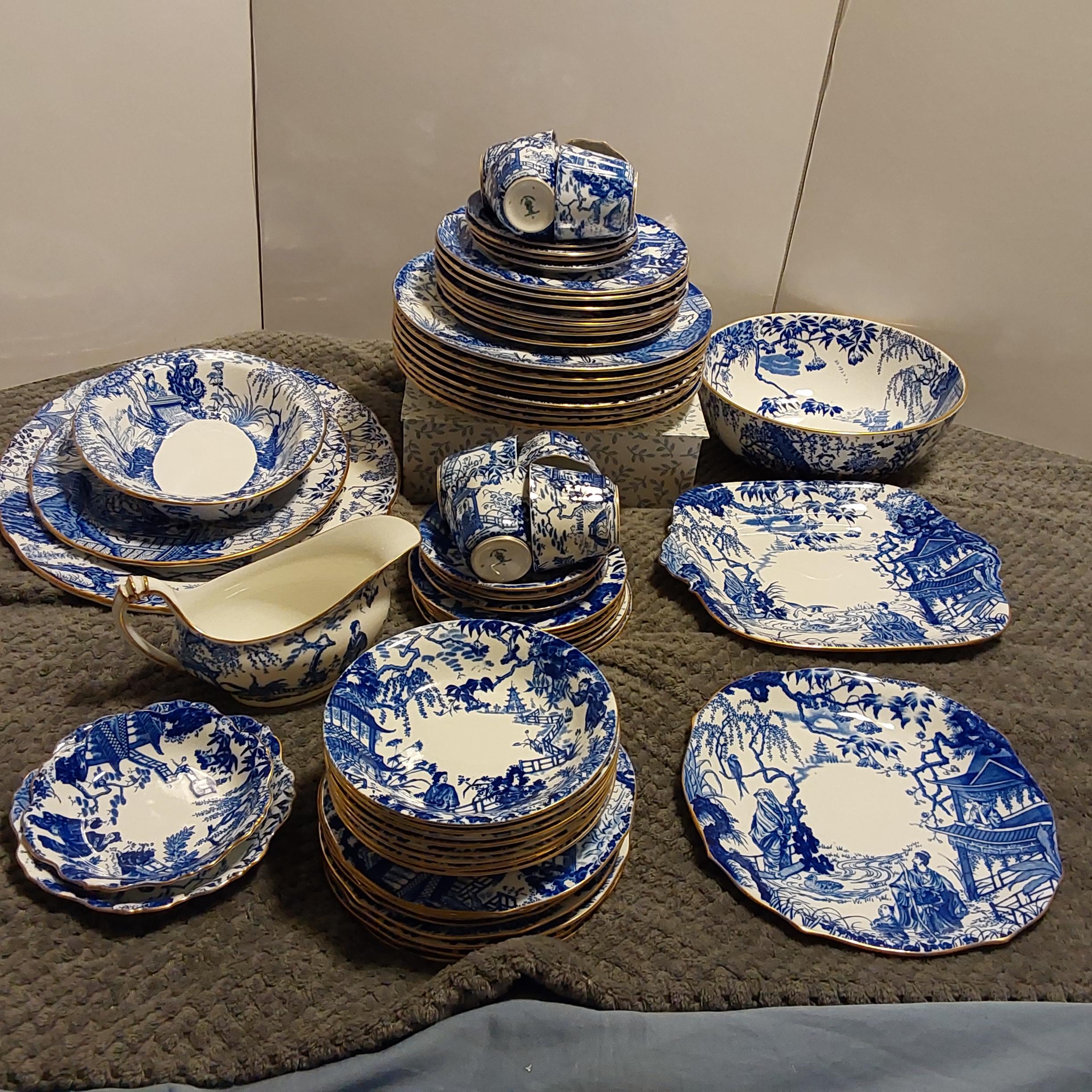 Photo of Royal Crown Derby Blue Mikado, 8 settings, 2 platters, 8 soup bowls 8 dessert plates, cake plate, 2 vegetable bowls, gravy boat and more.