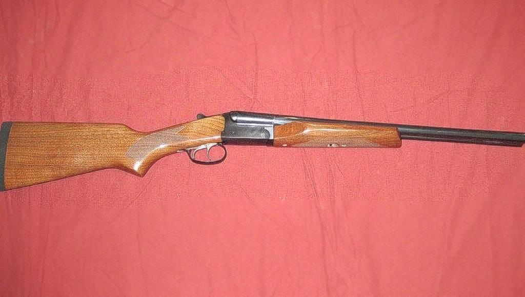 Photo of Stoeger double barrel 20 gauge couch gun