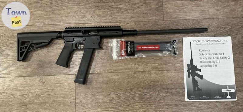 Photo of .45ACP TNW Aero Survival Rifle with 2 magazines and a stage 2 trigger assembly